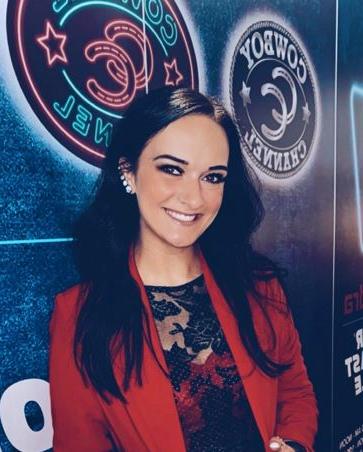 Woman posing at rodeo event